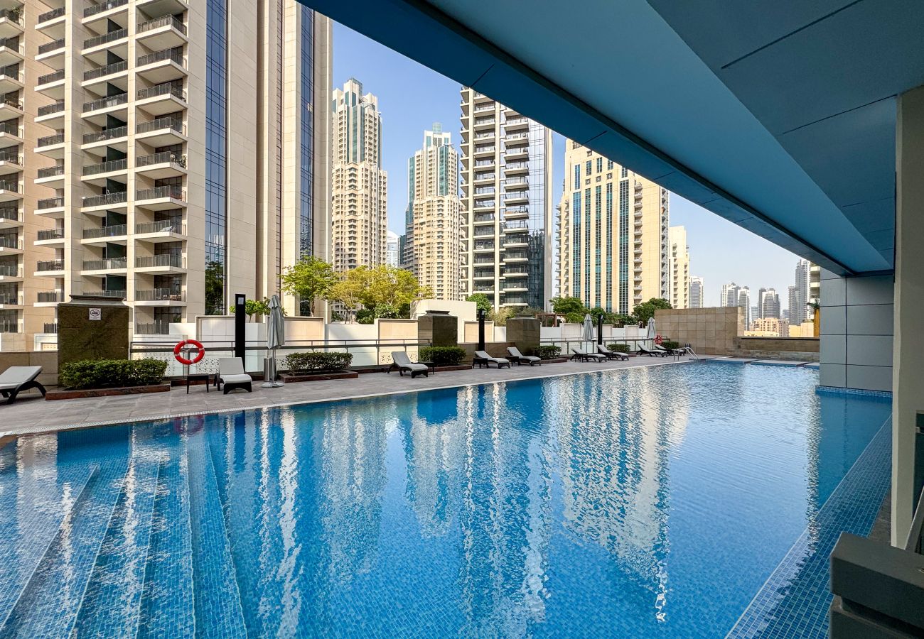 Ferienwohnung in Dubai - Spacious 1BR | Contemporary | Central