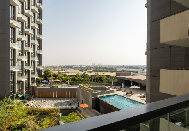 Apartamento en Dubai - Vista a la piscina y al jardín | Deluxe 1HAB | Acogedor