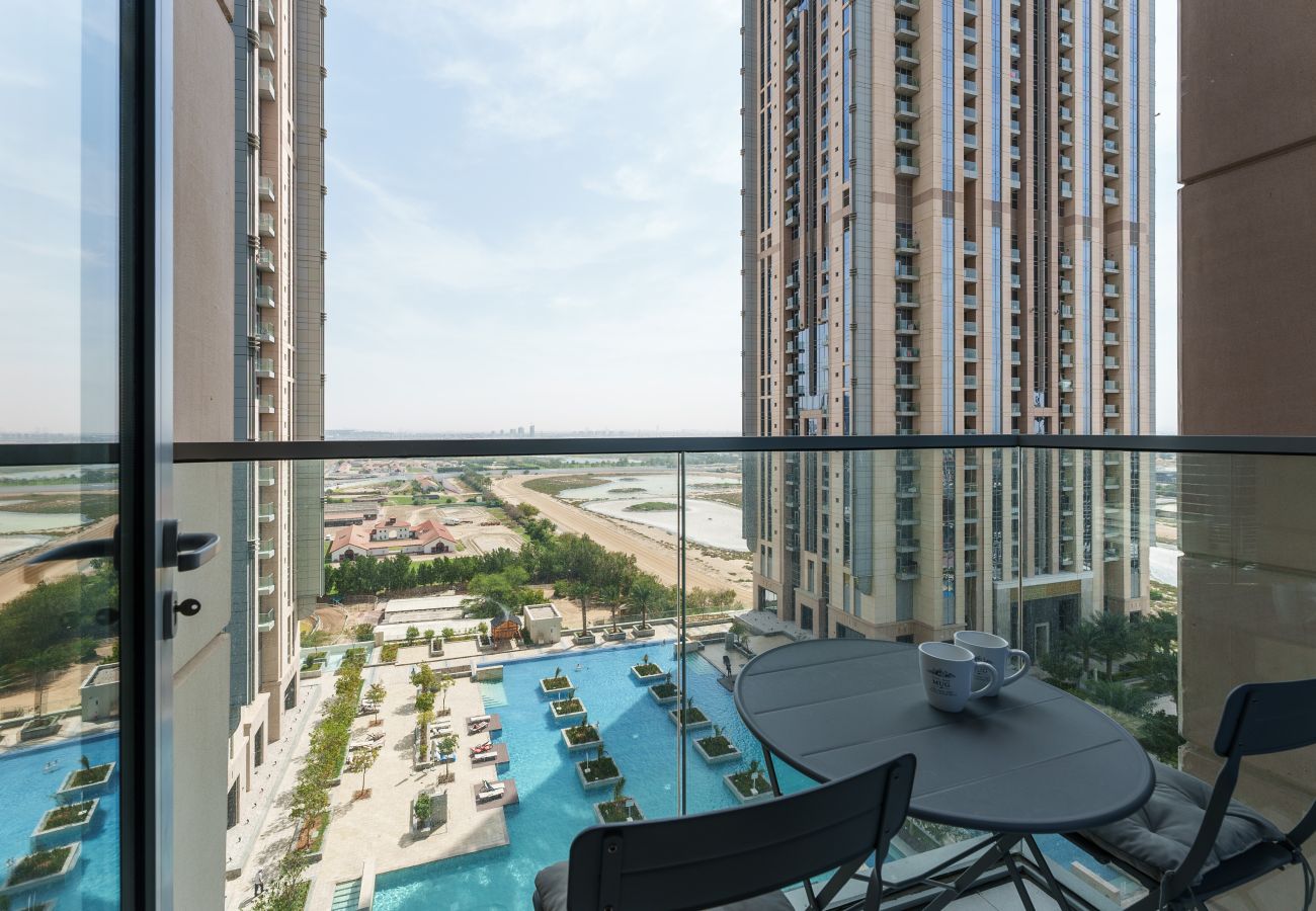 Appartement à Dubai - Deluxe 1BR | Piscines pour la nage en longueur | Près du centre ville