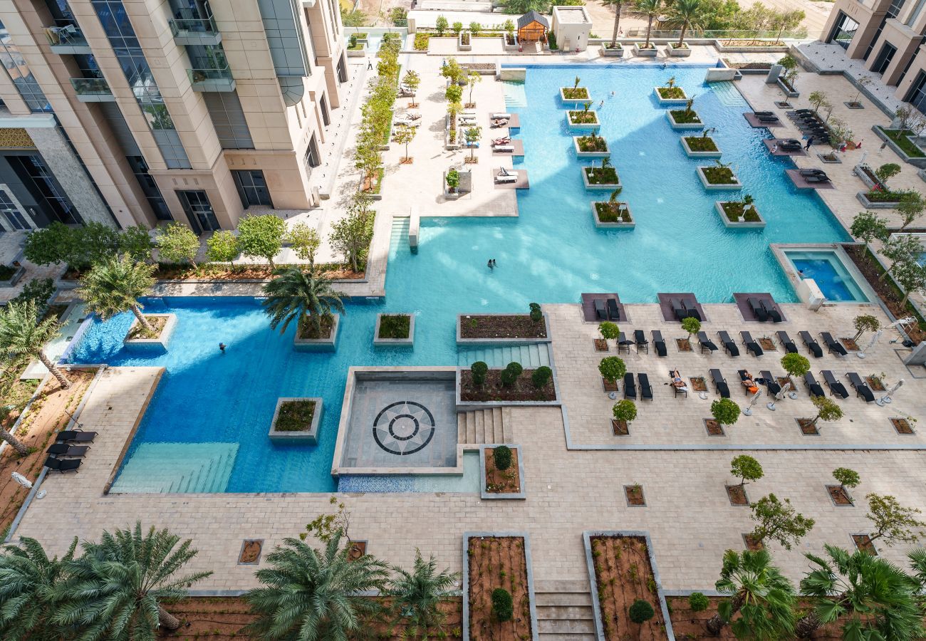 Appartement à Dubai - Deluxe 1BR | Piscines pour la nage en longueur | Près du centre ville